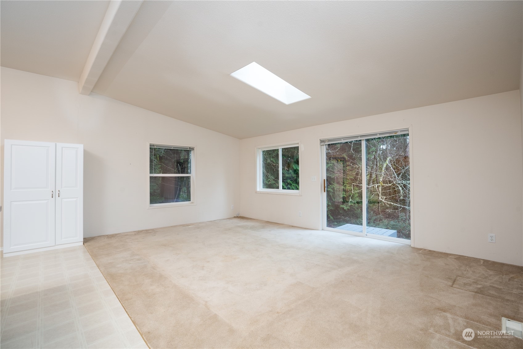 17908 Erickson Road Southwest Longbranch, WA 98351 - Photo 10 of 30 an empty room with windows and closet