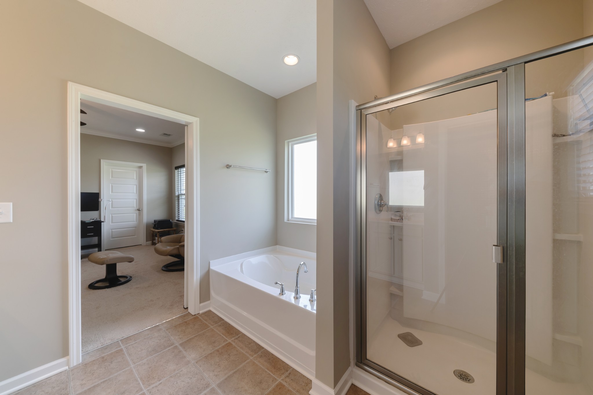 1426 Alamo Avenue Murfreesboro, TN 37129 - Photo 19 of 34 a bathroom with a glass shower door