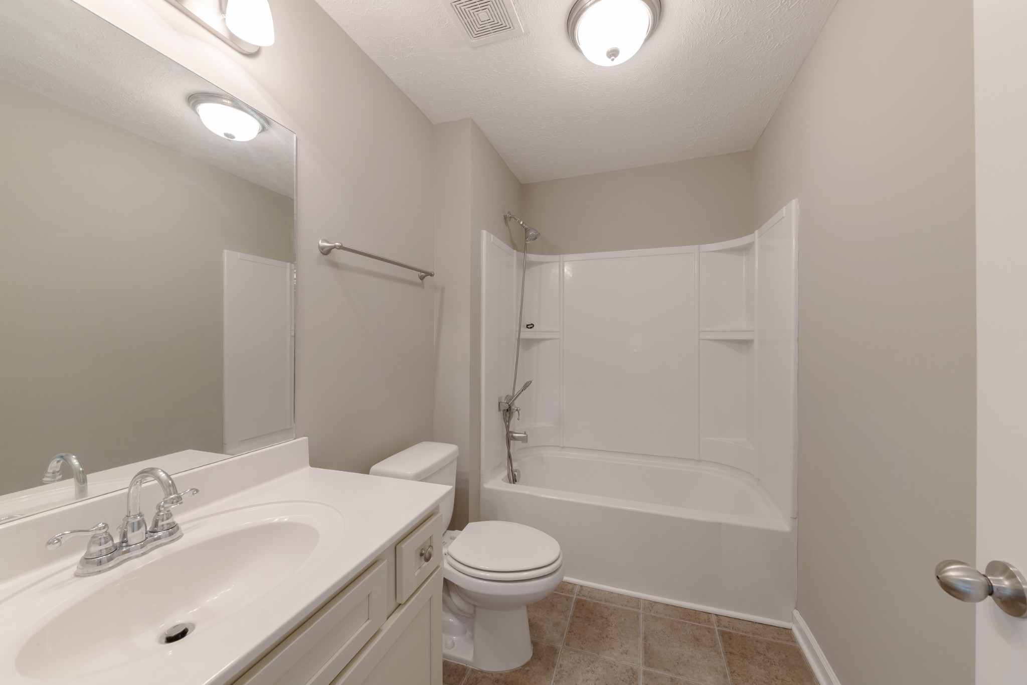 1426 Alamo Avenue Murfreesboro, TN 37129 - Photo 22 of 34 a bathroom with a sink toilet and shower