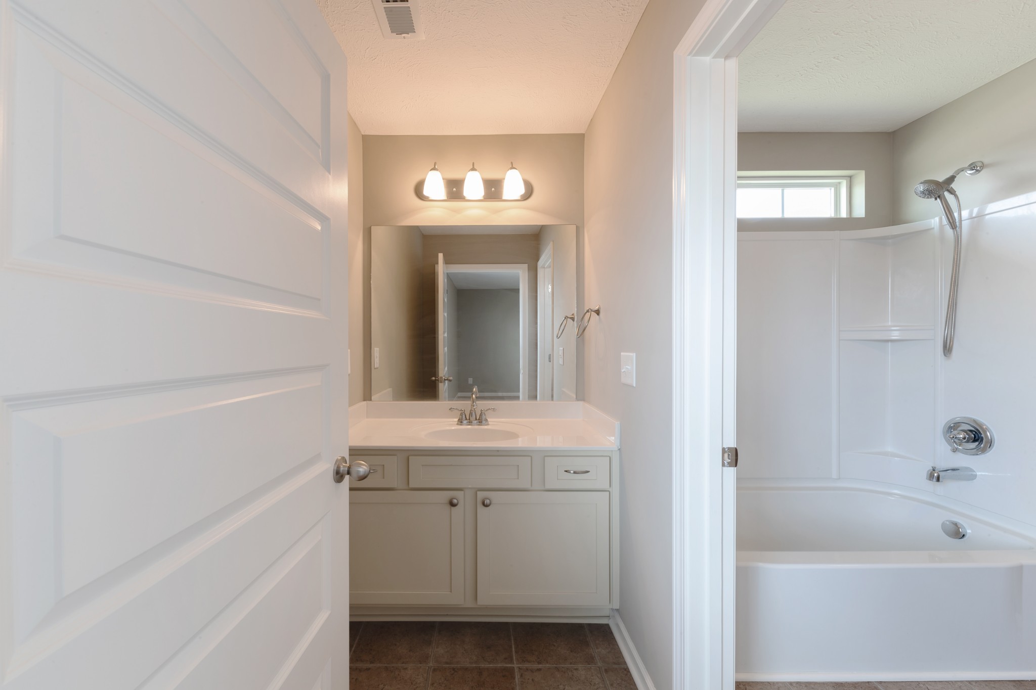 1426 Alamo Avenue Murfreesboro, TN 37129 - Photo 27 of 34 a bathroom with a sink a toilet and shower