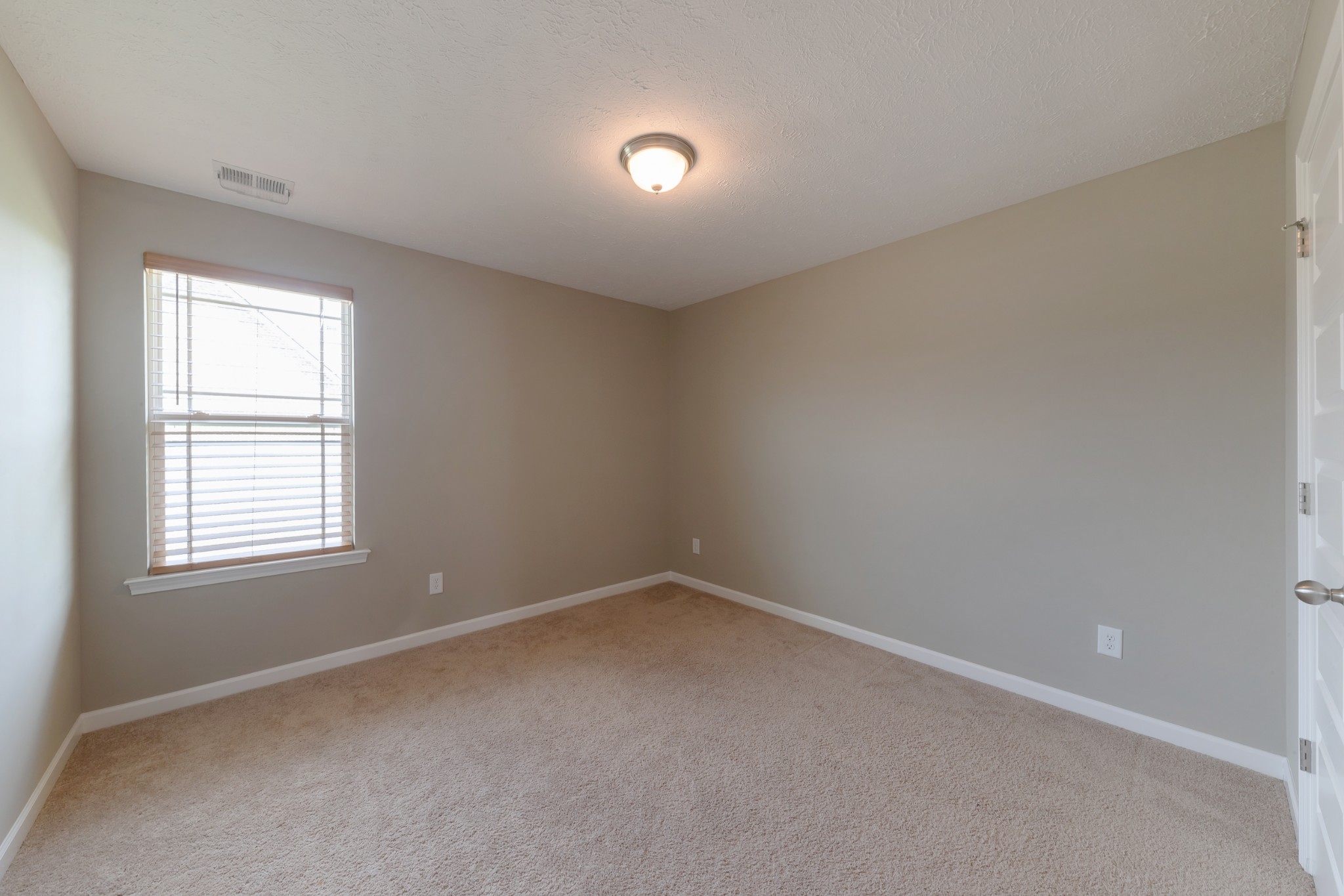 1426 Alamo Avenue Murfreesboro, TN 37129 - Photo 30 of 34 an empty room with a window