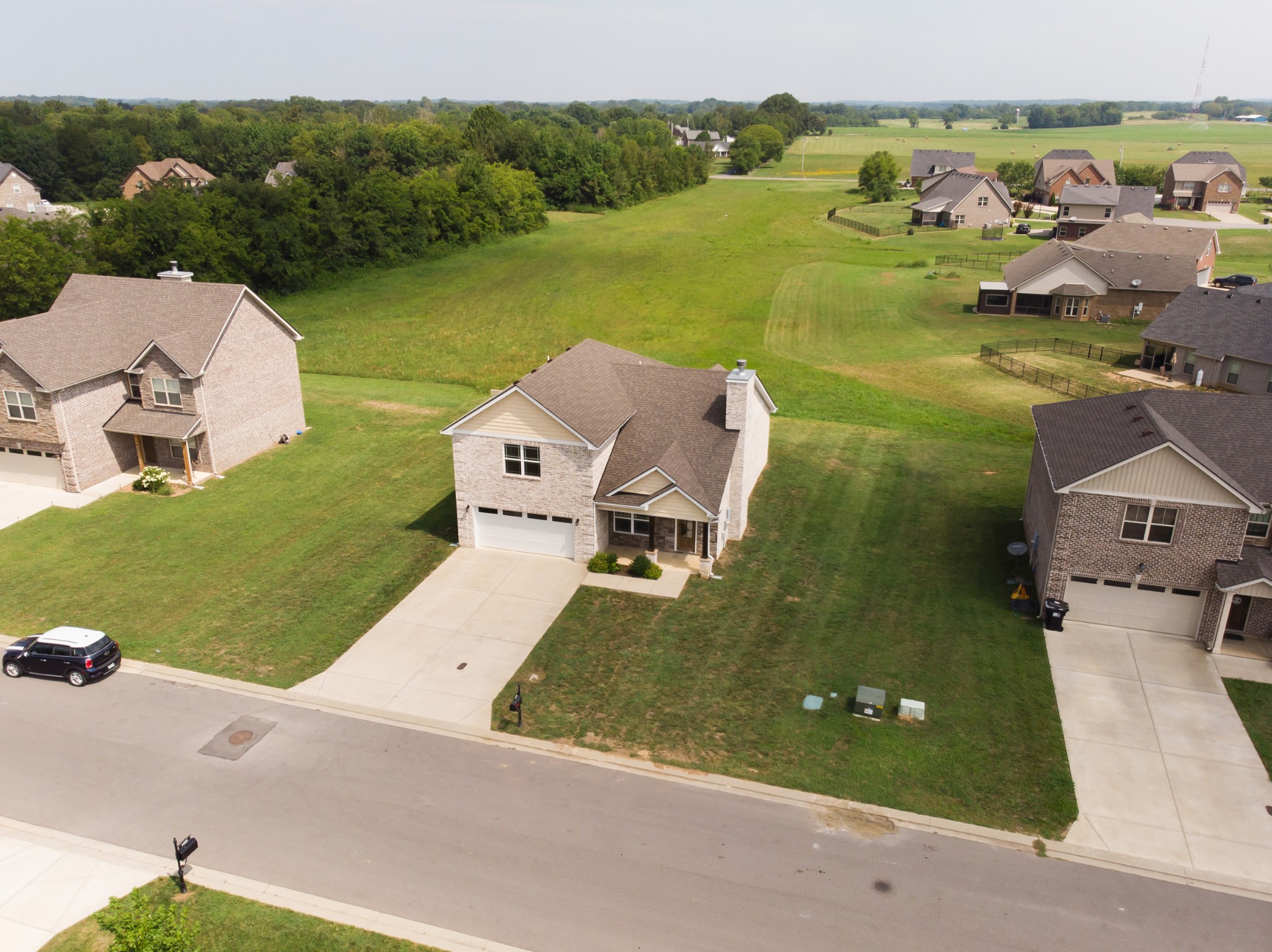 1426 Alamo Avenue Murfreesboro, TN 37129 - Photo 3 of 34 an aerial view of a house with a garden and lake view