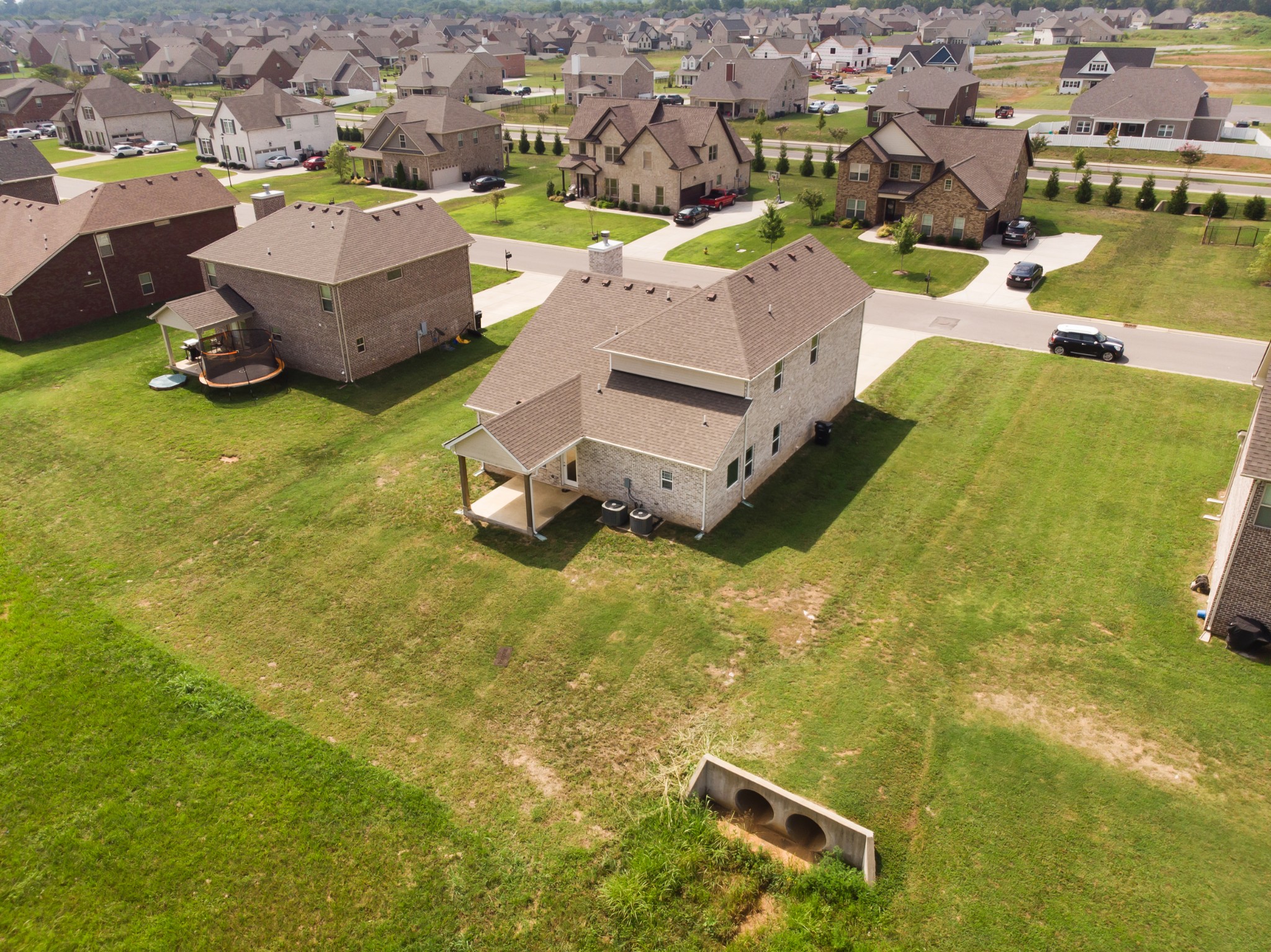 1426 Alamo Avenue Murfreesboro, TN 37129 - Photo 33 of 34 an aerial view of a house with a swimming pool