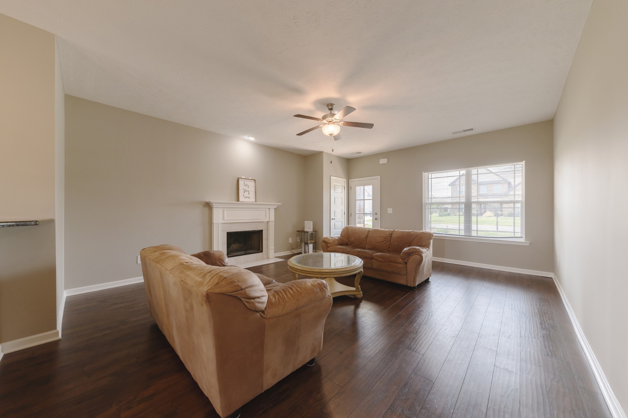 1426 Alamo Avenue Murfreesboro, TN 37129 - Photo 6 of 34 a living room with furniture and a fireplace