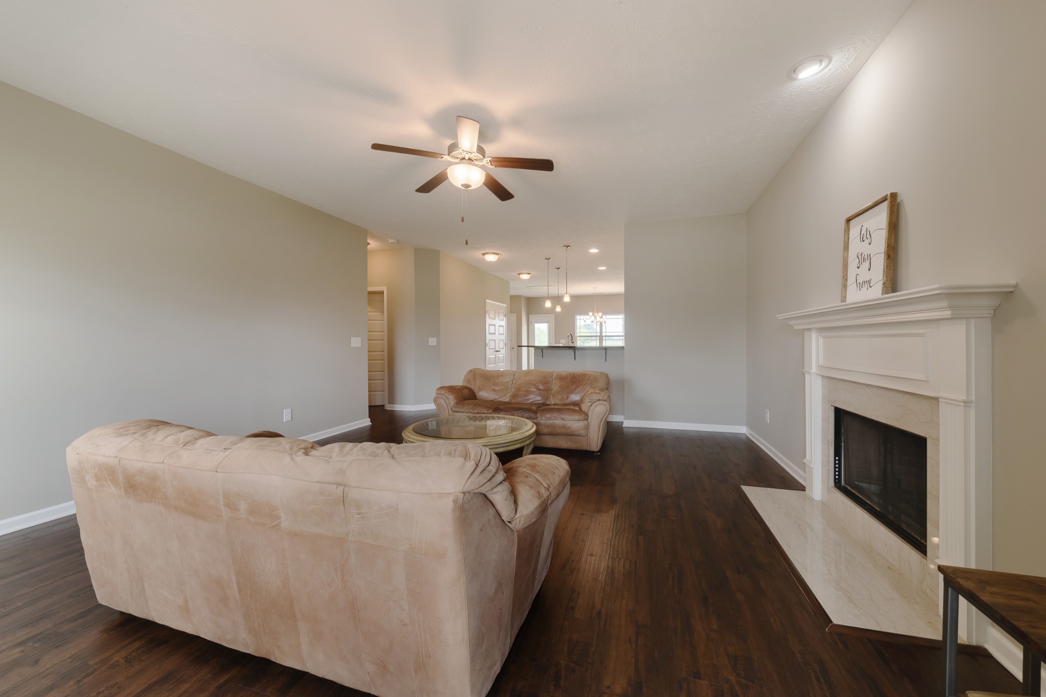1426 Alamo Avenue Murfreesboro, TN 37129 - Photo 8 of 34 a living room with furniture and a fireplace