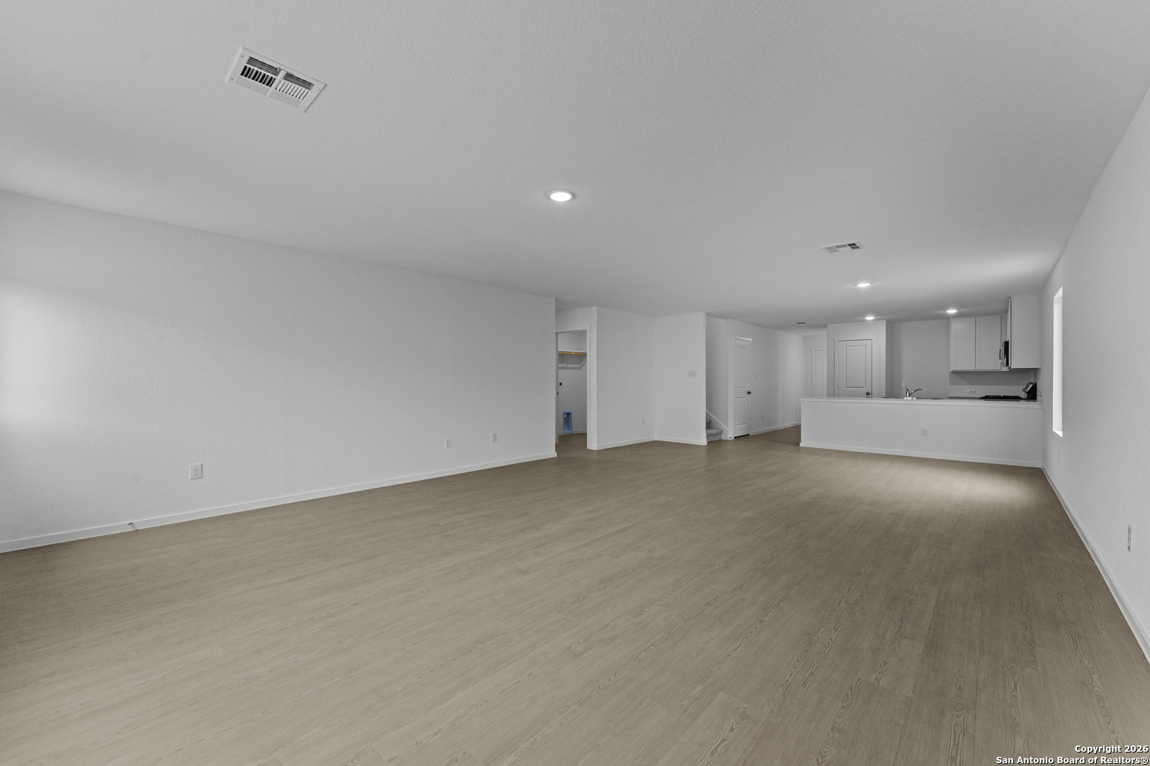 1834 Stonechat New Braunfels, TX 78130 - Photo 11 of 29 a view of a kitchen with a sink and cabinets