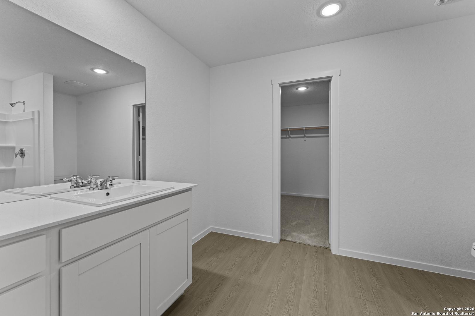 1834 Stonechat New Braunfels, TX 78130 - Photo 15 of 29 a bathroom with a sink and a mirror