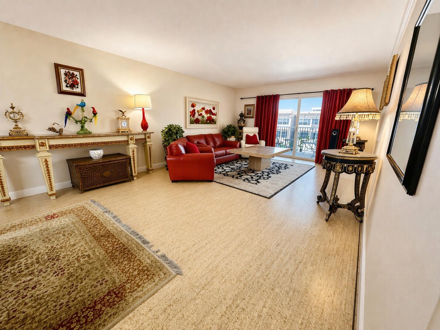 800 East Camino Real, Unit 416 Boca Raton, FL 33432 - Photo 4 of 18 a living room with furniture and a rug