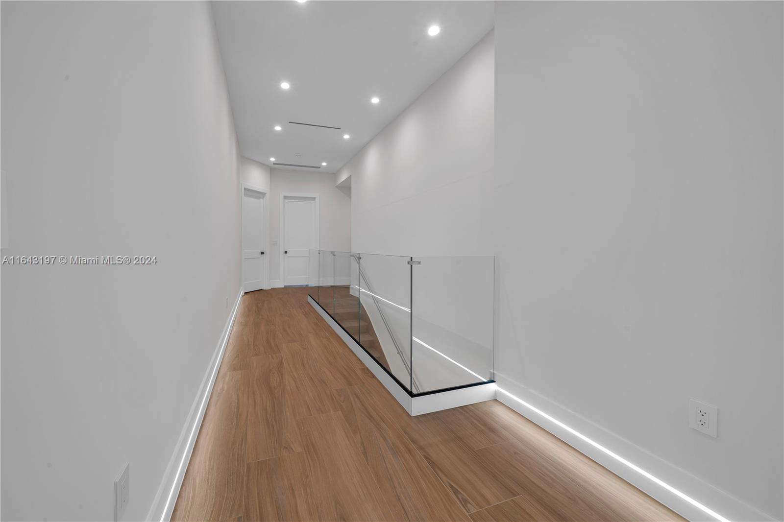 8821 Southwest 56th Street Miami, FL 33165 - Photo 12 of 49 a view of a room with wooden floor