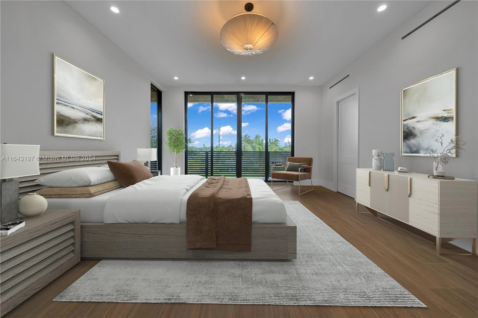 8821 Southwest 56th Street Miami, FL 33165 - Photo 15 of 49 a bedroom with a large bed and a large window