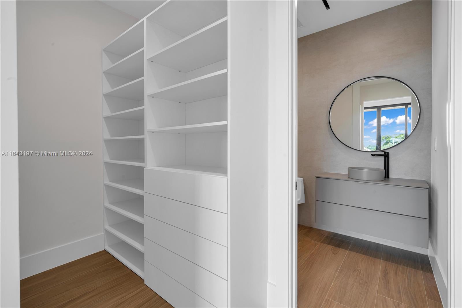 8821 Southwest 56th Street Miami, FL 33165 - Photo 27 of 49 a view of a livingroom with furniture wooden floor and staircase