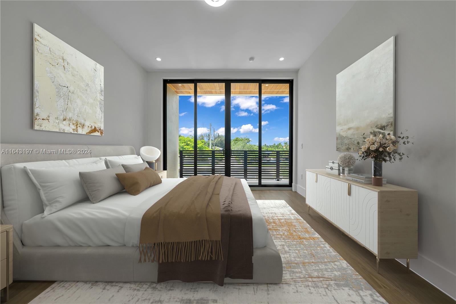 8821 Southwest 56th Street Miami, FL 33165 - Photo 30 of 49 a living room with a large bed and a large window