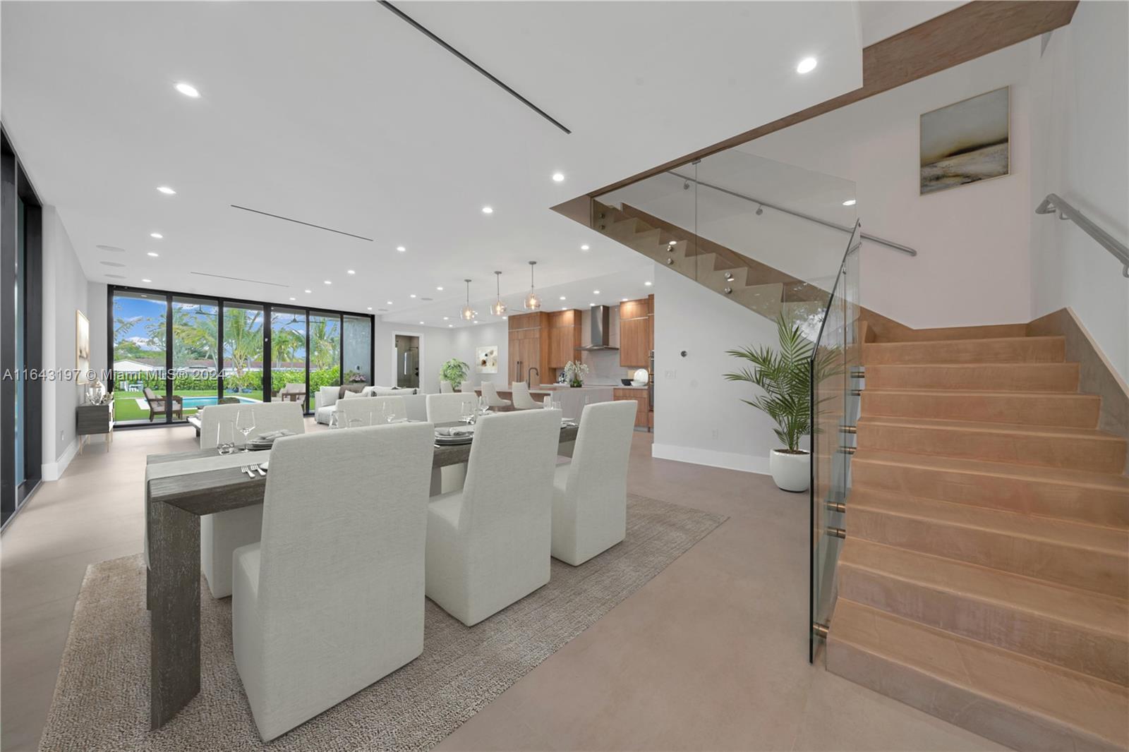 8821 Southwest 56th Street Miami, FL 33165 - Photo 3 of 49 a living room with furniture and a table