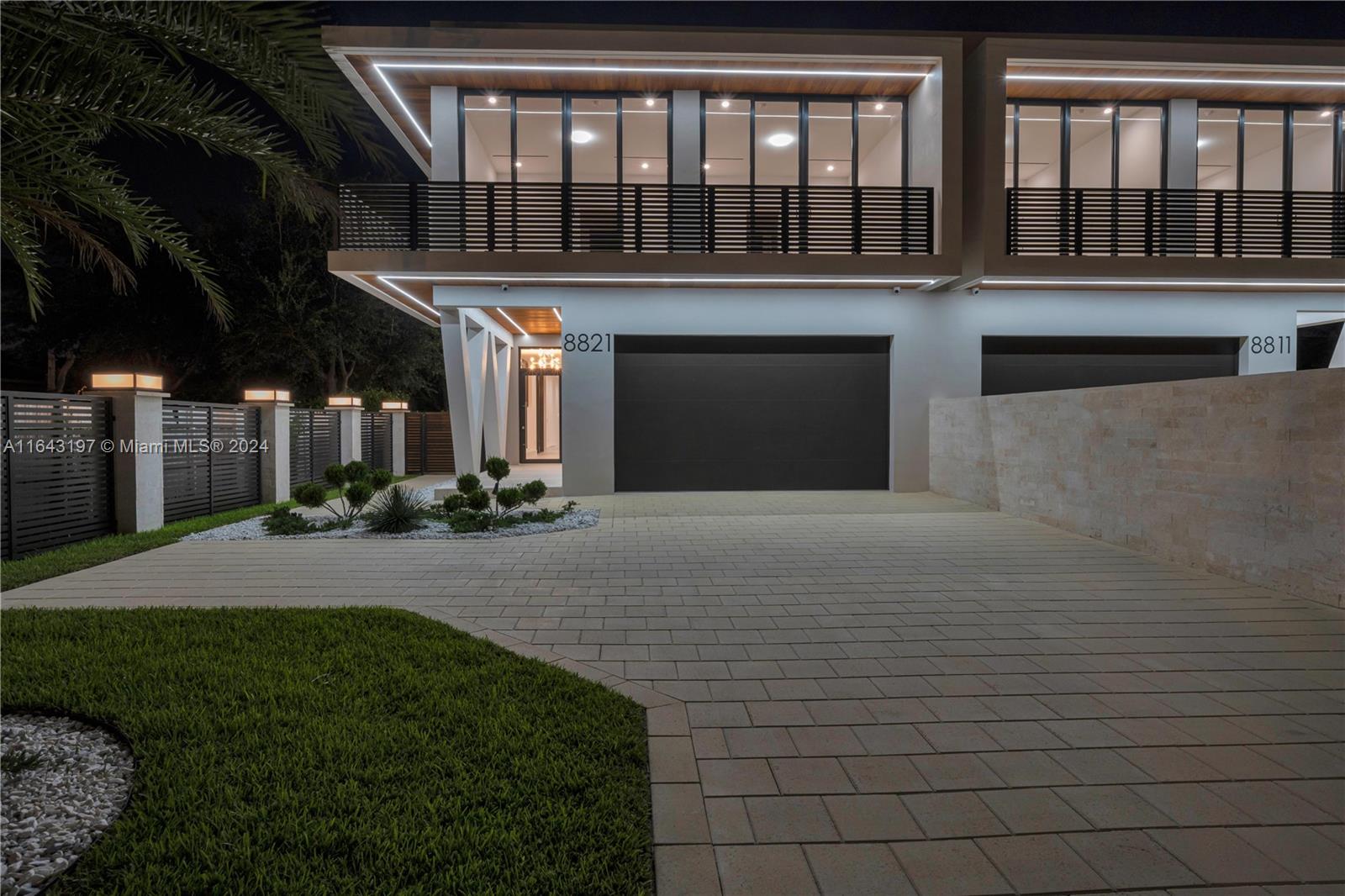 8821 Southwest 56th Street Miami, FL 33165 - Photo 45 of 49 a front view of a house with a yard