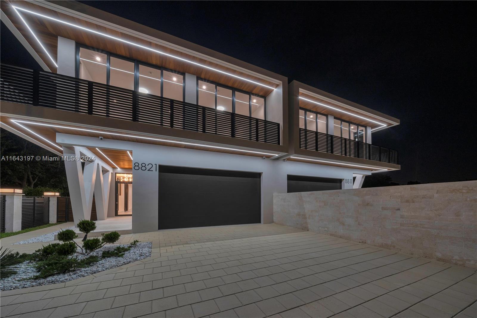 8821 Southwest 56th Street Miami, FL 33165 - Photo 46 of 49 a front view of a house with entryway