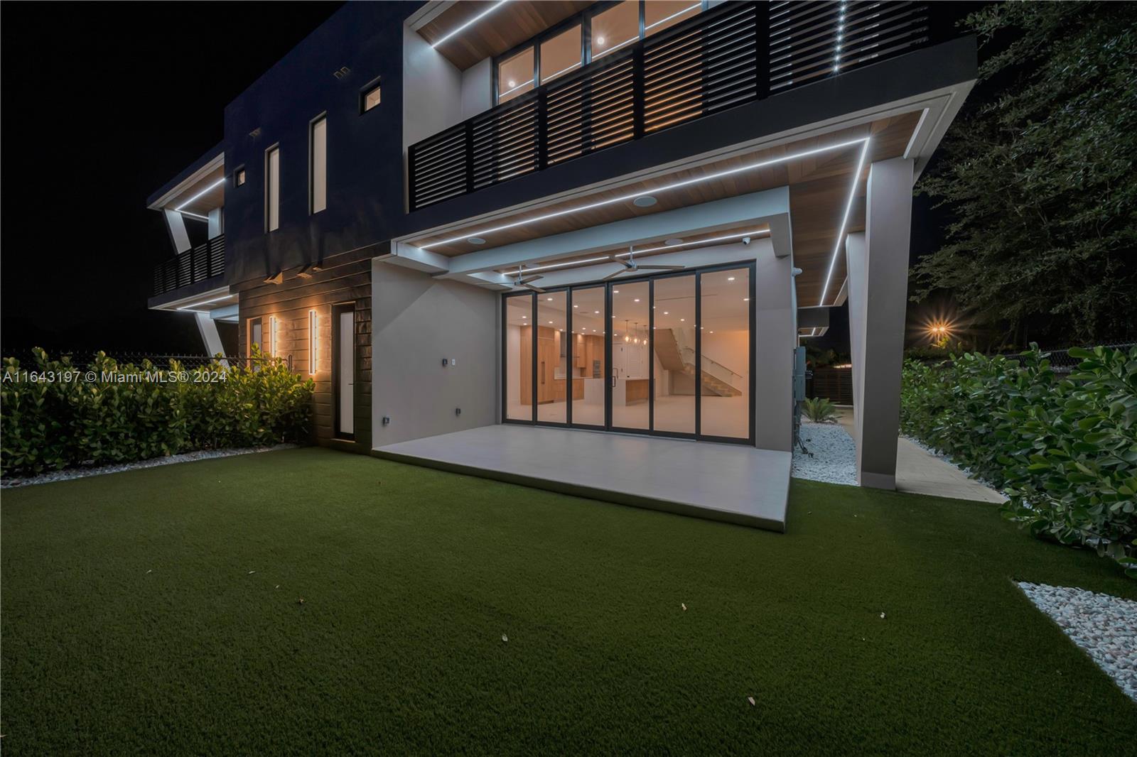 8821 Southwest 56th Street Miami, FL 33165 - Photo 49 of 49 a view of backyard with plants and large tree