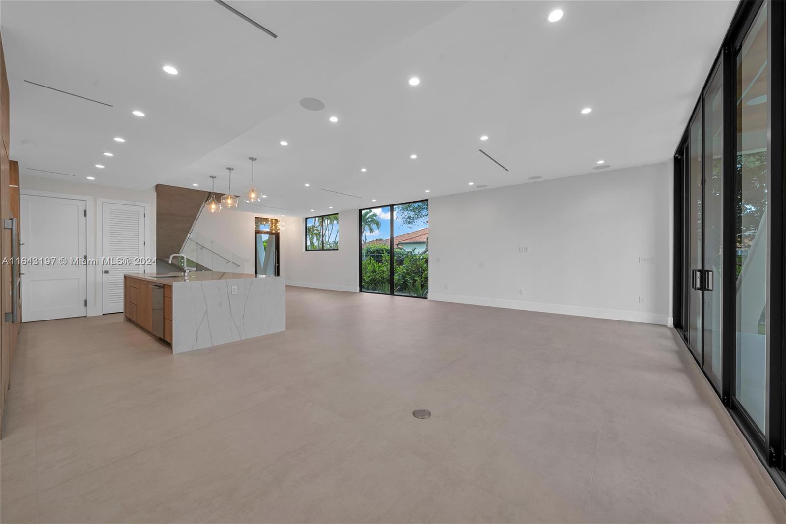 8821 Southwest 56th Street Miami, FL 33165 - Photo 6 of 49 a view of kitchen with refrigerator and white walls