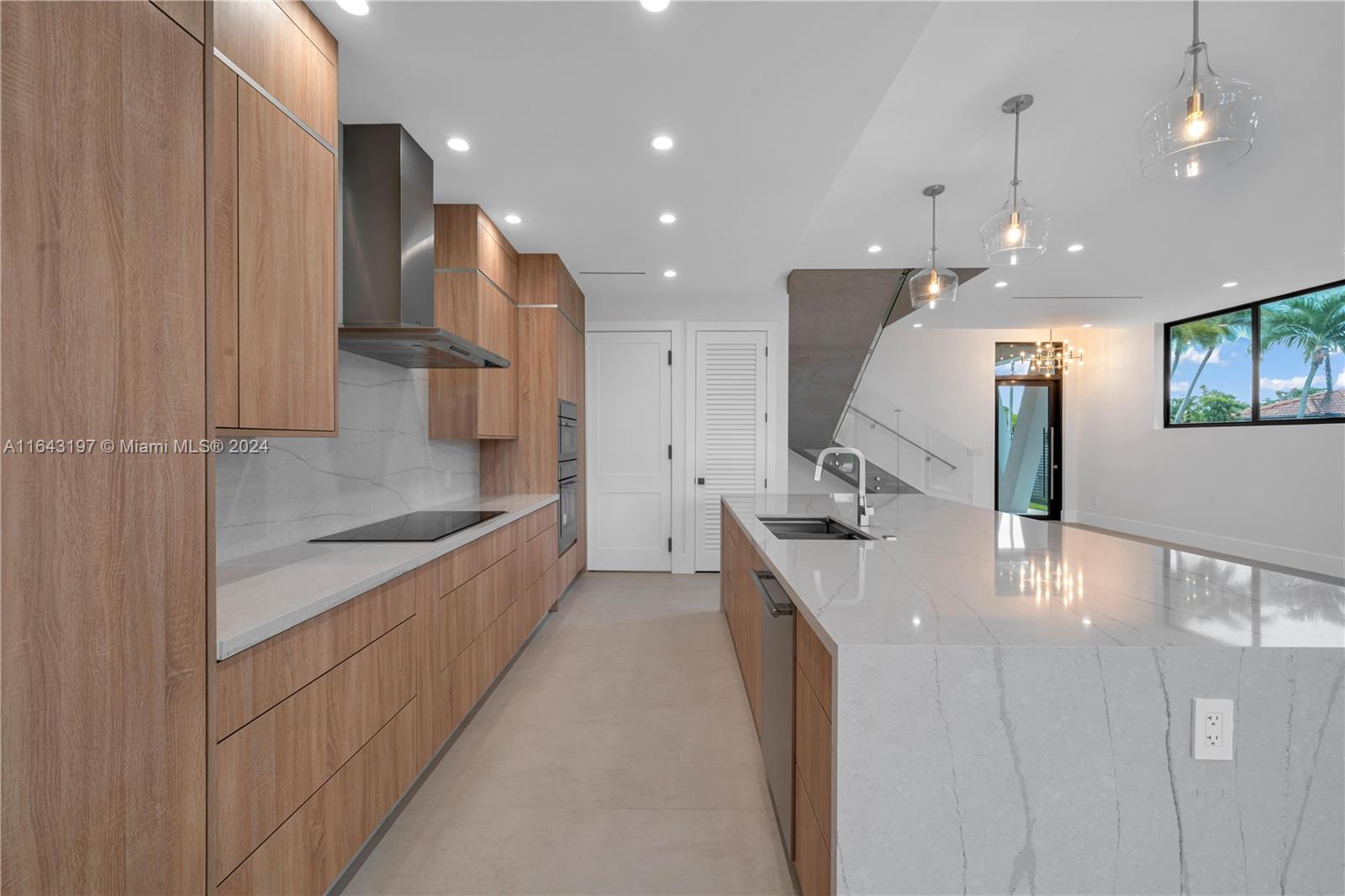 8821 Southwest 56th Street Miami, FL 33165 - Photo 7 of 49 a large kitchen with a large counter top appliances and cabinets