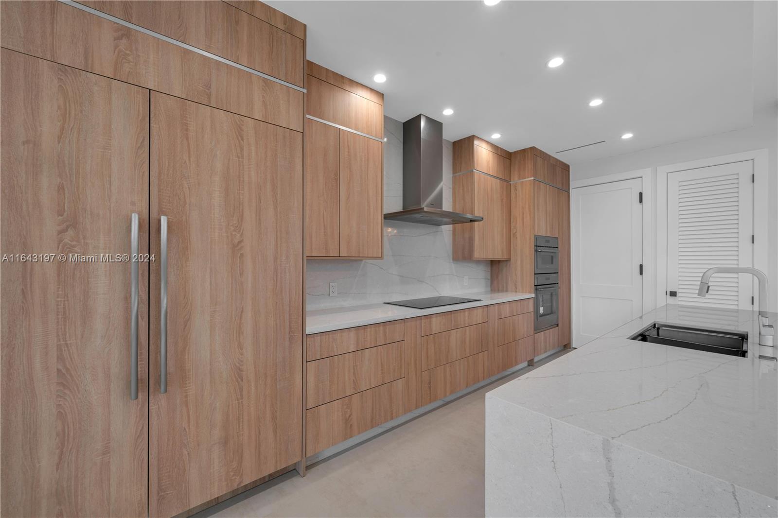 8821 Southwest 56th Street Miami, FL 33165 - Photo 8 of 49 a large bathroom with a glass shower door and a sink