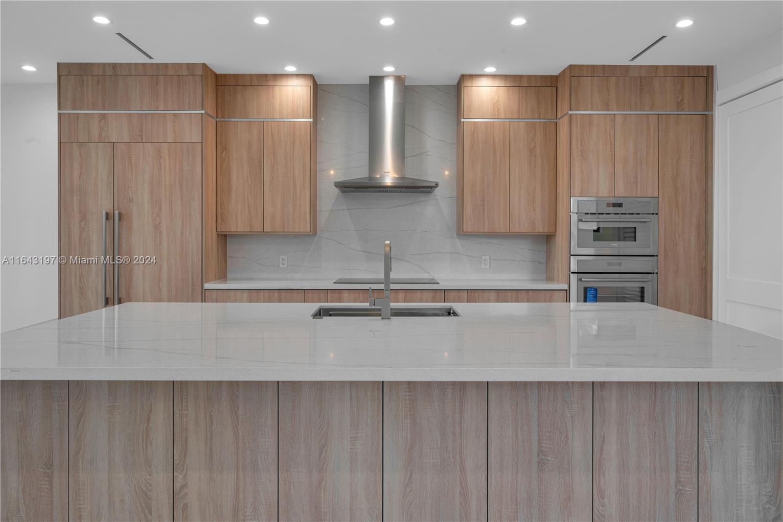 8821 Southwest 56th Street Miami, FL 33165 - Photo 9 of 49 a view of kitchen with stainless steel appliances kitchen island a wooden cabinets and a floors