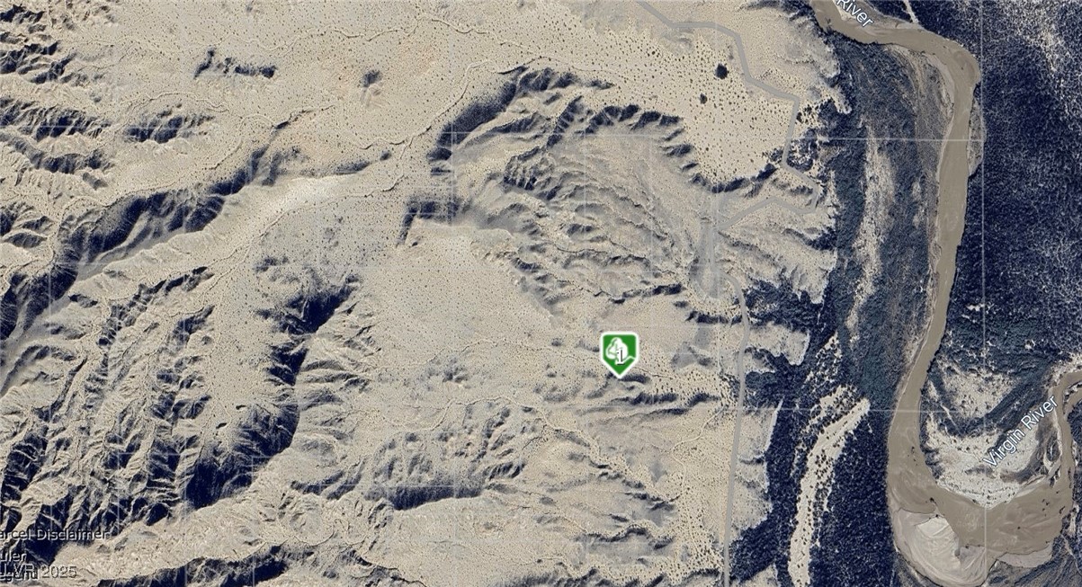 Birds eye view of property with view of desert