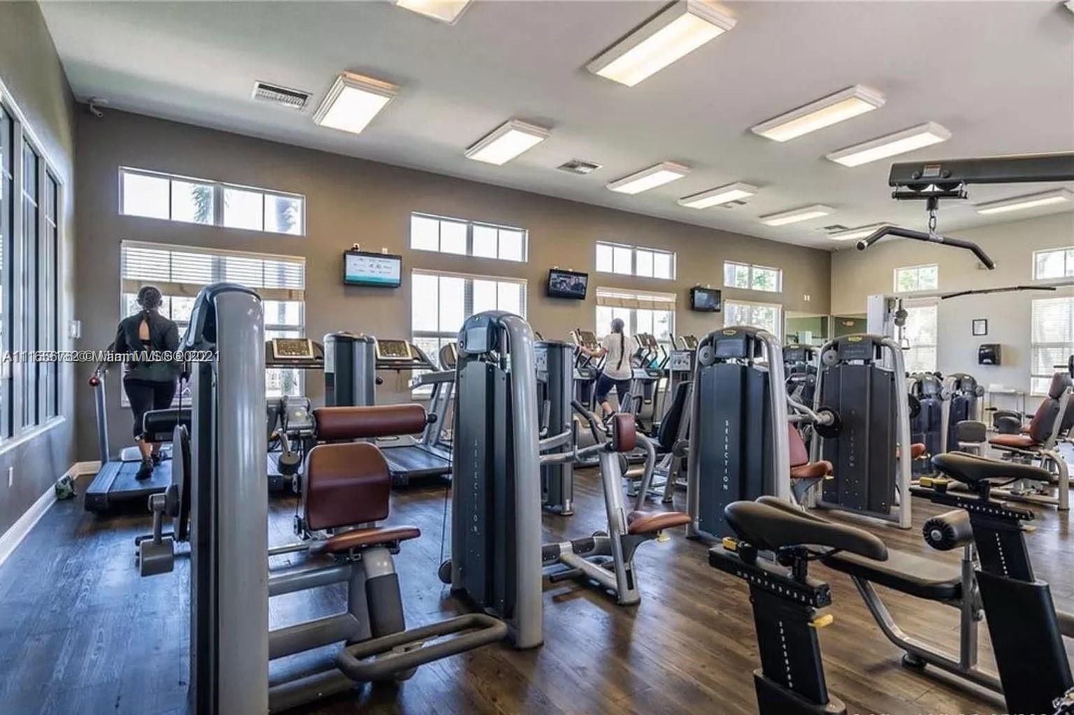 22025 Southwest 88th Path Cutler Bay, FL 33190 - Photo 32 of 34 a view of a room with gym equipment