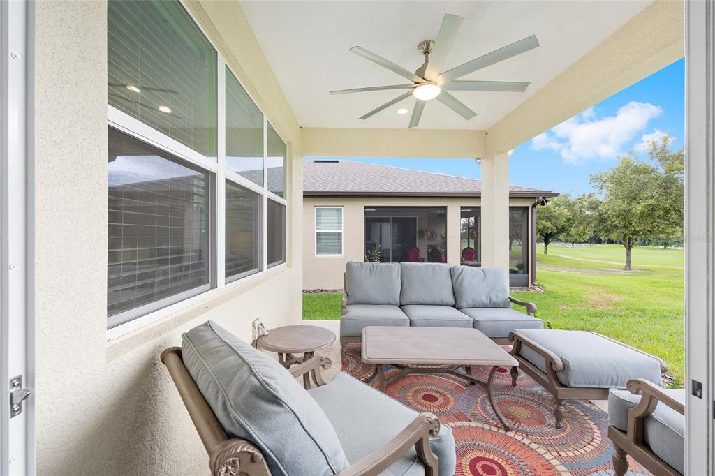 8989 Southwest 57th Pl Road Ocala, FL 34481 - Photo 34 of 47 a living room with furniture and a large window