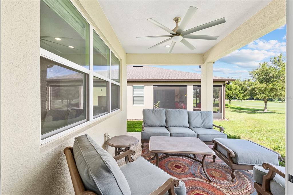 8989 Southwest 57th Pl Road Ocala, FL 34481 - Photo 38 of 47 a living room with furniture and a large window