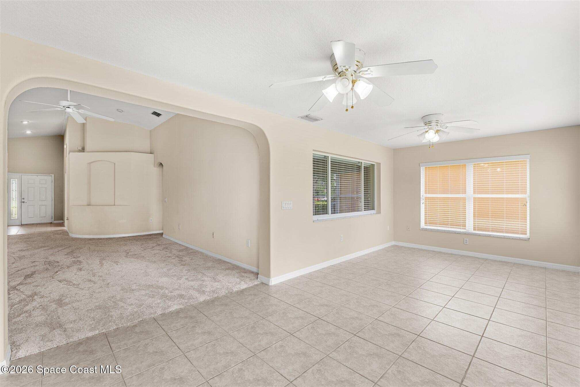 6904 Renshaw Drive Melbourne, FL 32940 - Photo 19 of 46 a view of an empty room with a window