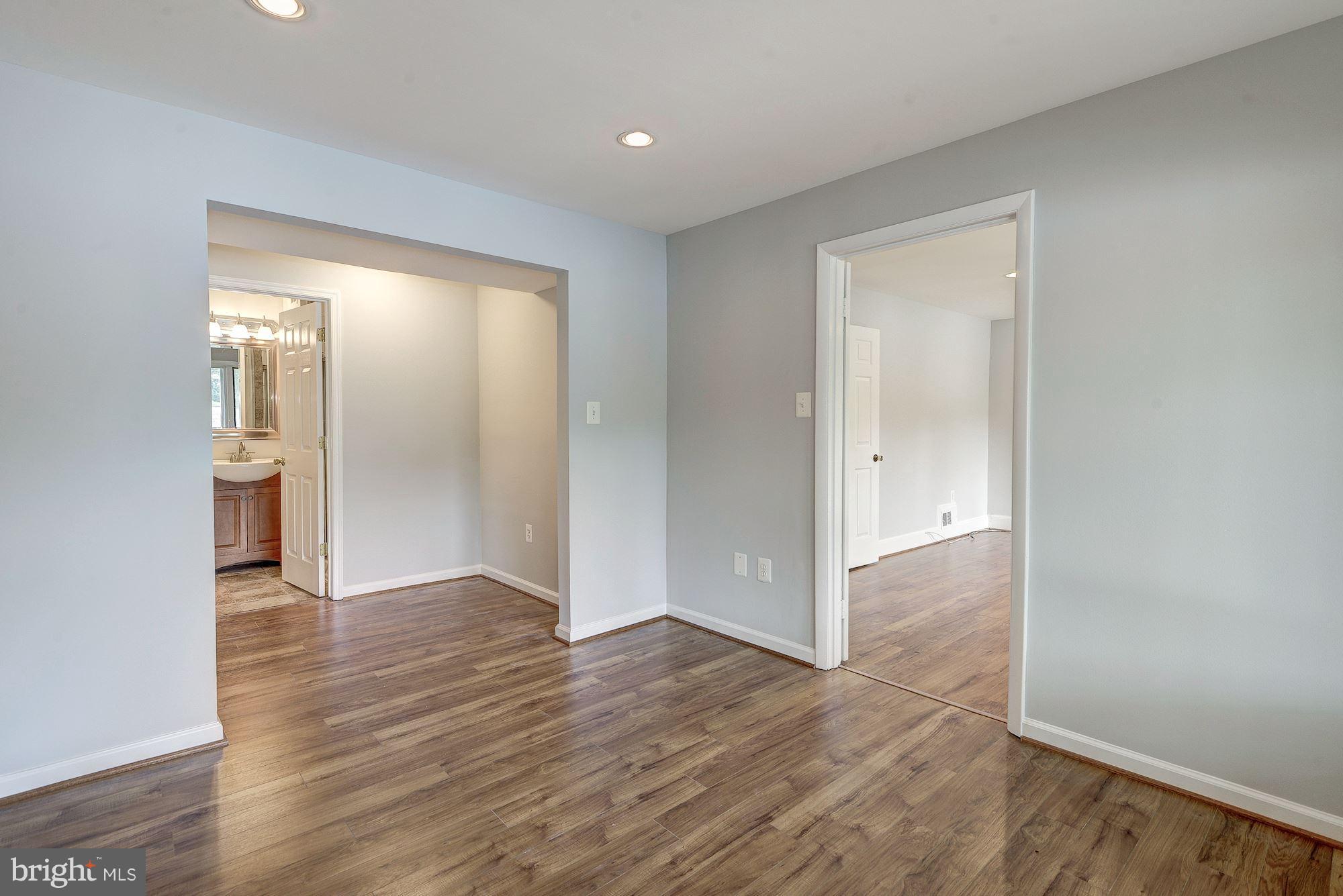 1652 Waters Edge Lane Reston, VA 20190 - Photo 18 of 24 Lower level bedroom with lake view