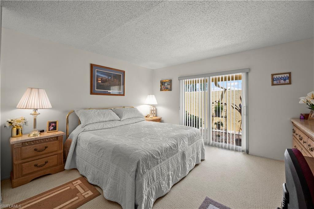 116 Harrison Road, Unit N3 Naples, FL 34112 - Photo 15 of 24 Spacious master bedroom