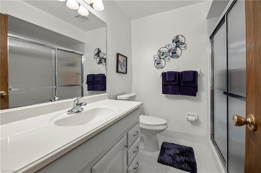 116 Harrison Road, Unit N3 Naples, FL 34112 - Photo 17 of 24 Master bathroom with walk in shower