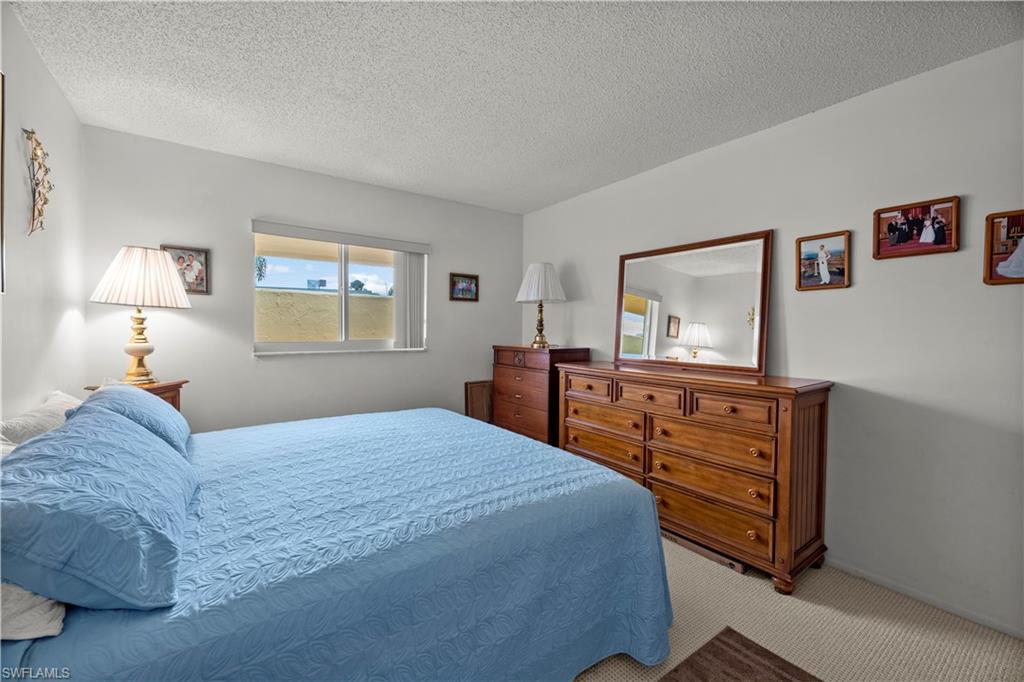 116 Harrison Road, Unit N3 Naples, FL 34112 - Photo 18 of 24 Guest Bedroom