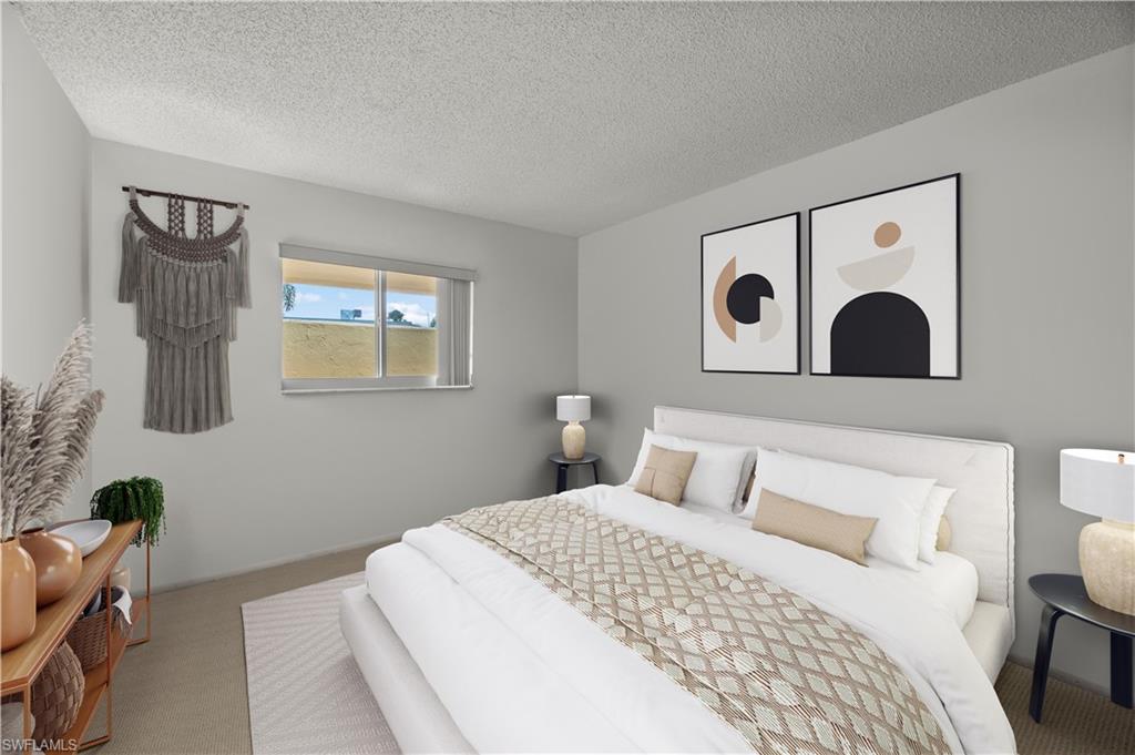 116 Harrison Road, Unit N3 Naples, FL 34112 - Photo 19 of 24 Virtually staged light and bright guest bedroom