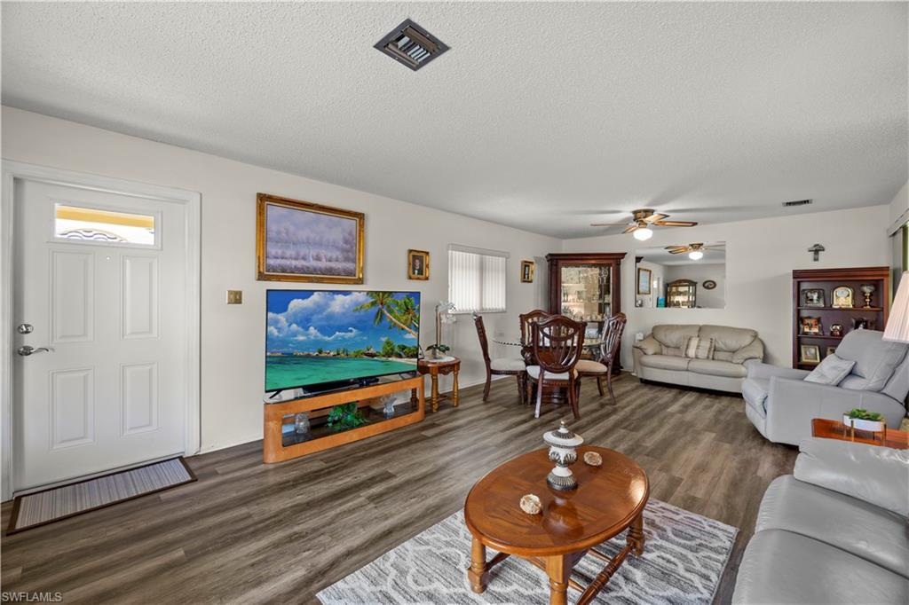 116 Harrison Road, Unit N3 Naples, FL 34112 - Photo 7 of 24 Living and dining area