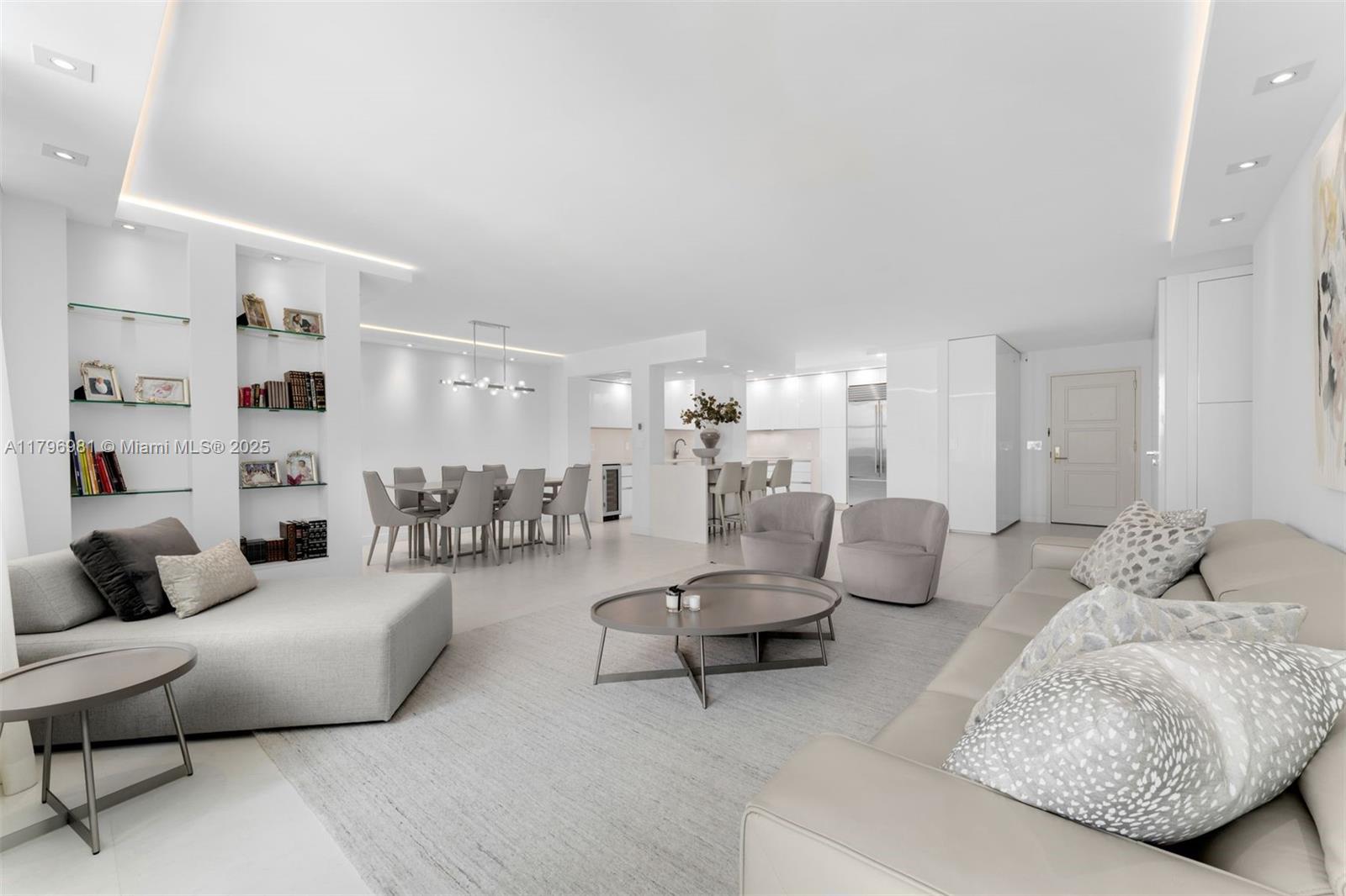 9801 Collins Avenue, Unit 17P Bal Harbour, FL 33154 - Photo 4 of 31 a living room with furniture and view of kitchen