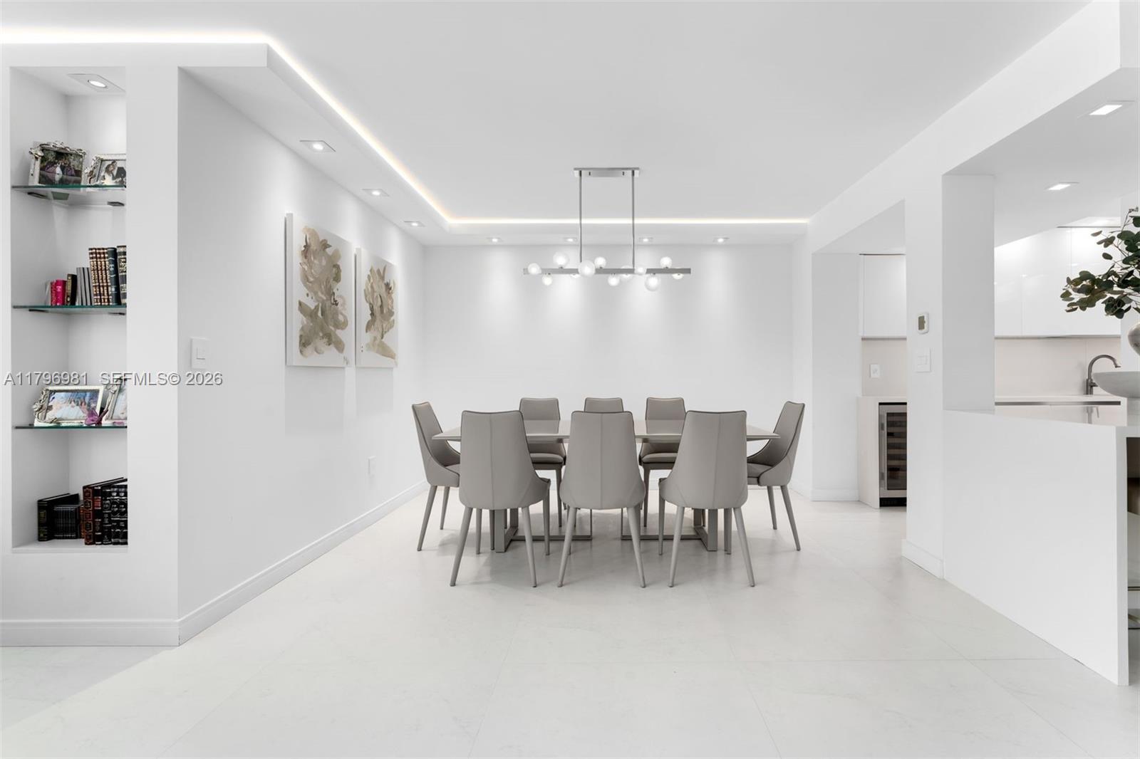 9801 Collins Avenue, Unit 17P Bal Harbour, FL 33154 - Photo 7 of 31 a view of a dining room with furniture