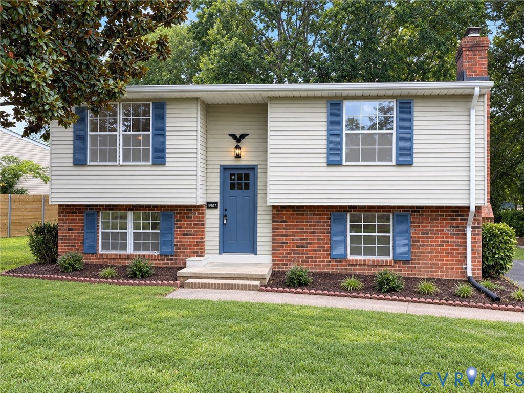 5907 Stella Road Richmond, VA 23234 - Photo 1 of 1 Split-level residence featuring a brick foundation