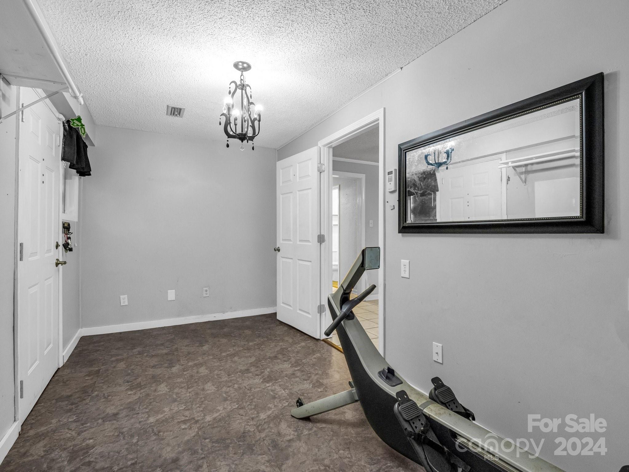 3401 Spencer Road Conover, NC 28613 - Photo 12 of 34 a view of a room with gym equipment