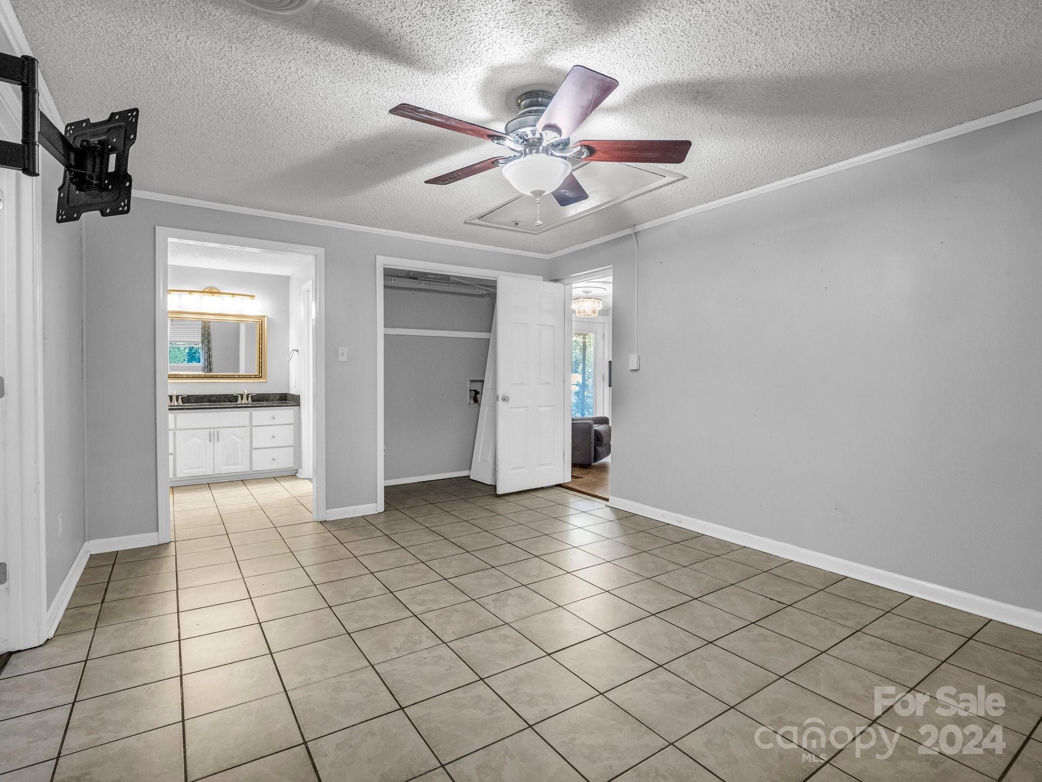 3401 Spencer Road Conover, NC 28613 - Photo 15 of 34 a view of a livingroom with a ceiling fan and window