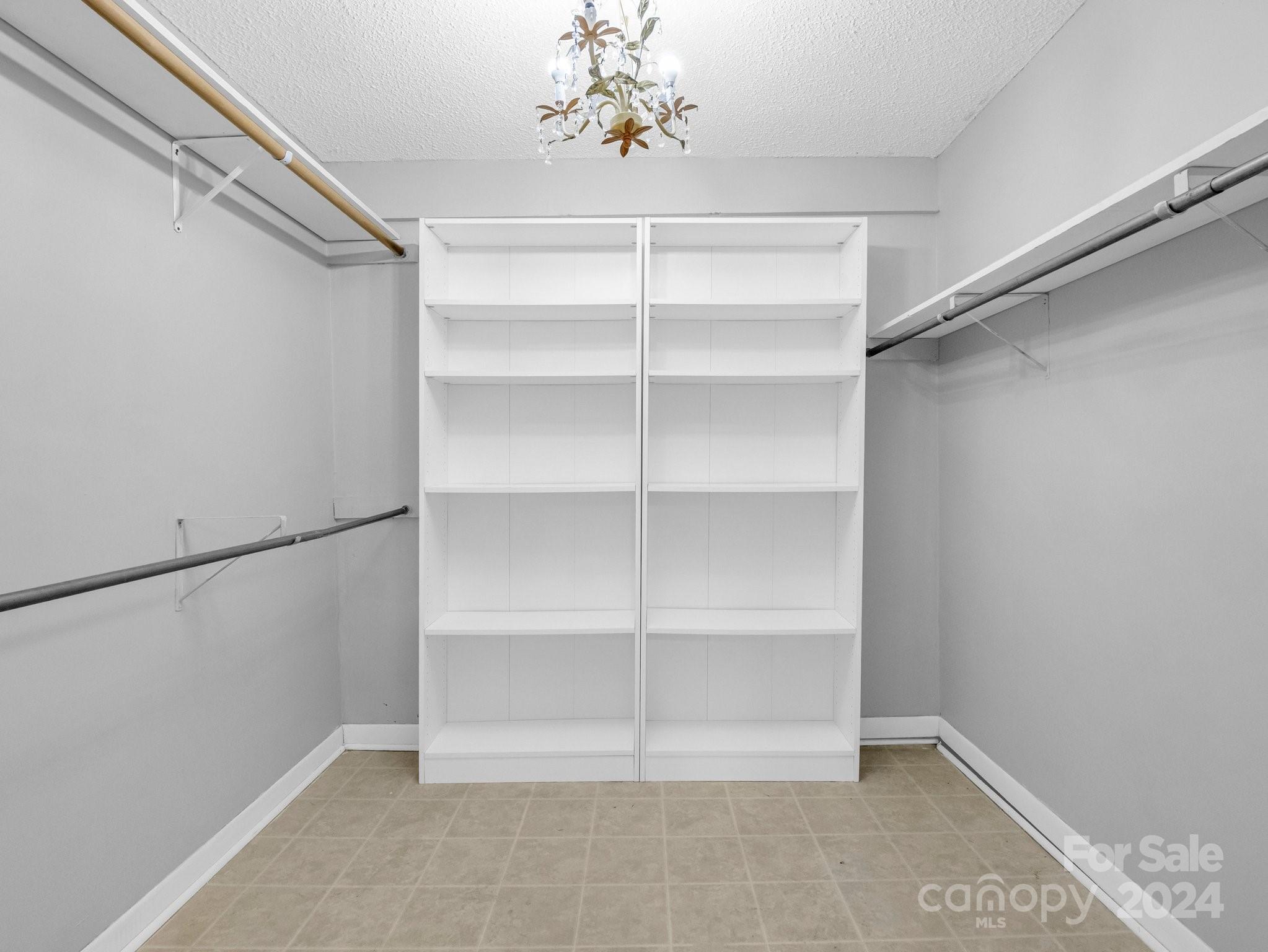3401 Spencer Road Conover, NC 28613 - Photo 16 of 34 a view of a room with shelf on the wall