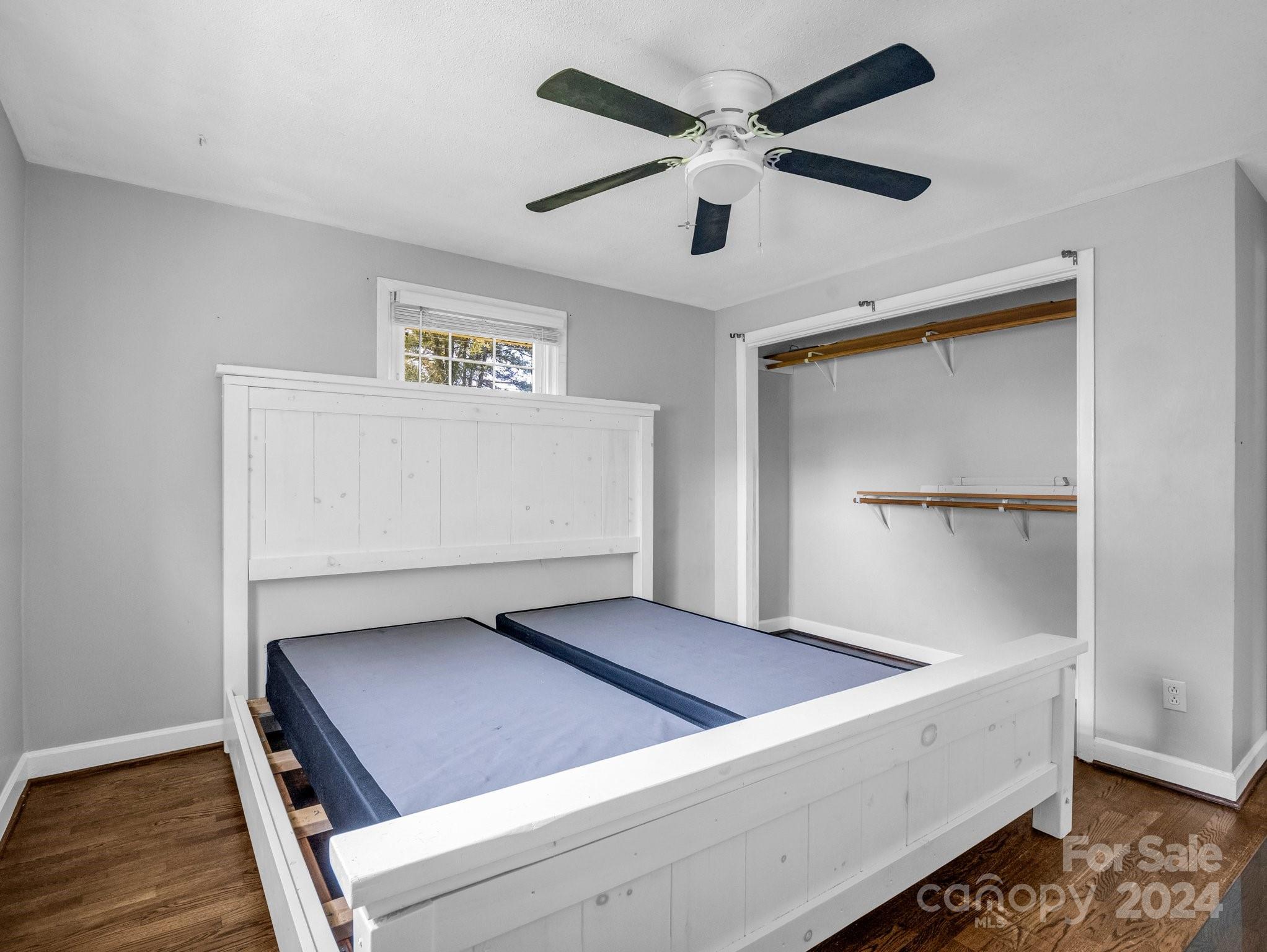 3401 Spencer Road Conover, NC 28613 - Photo 25 of 34 a room with a bed and a ceiling fan