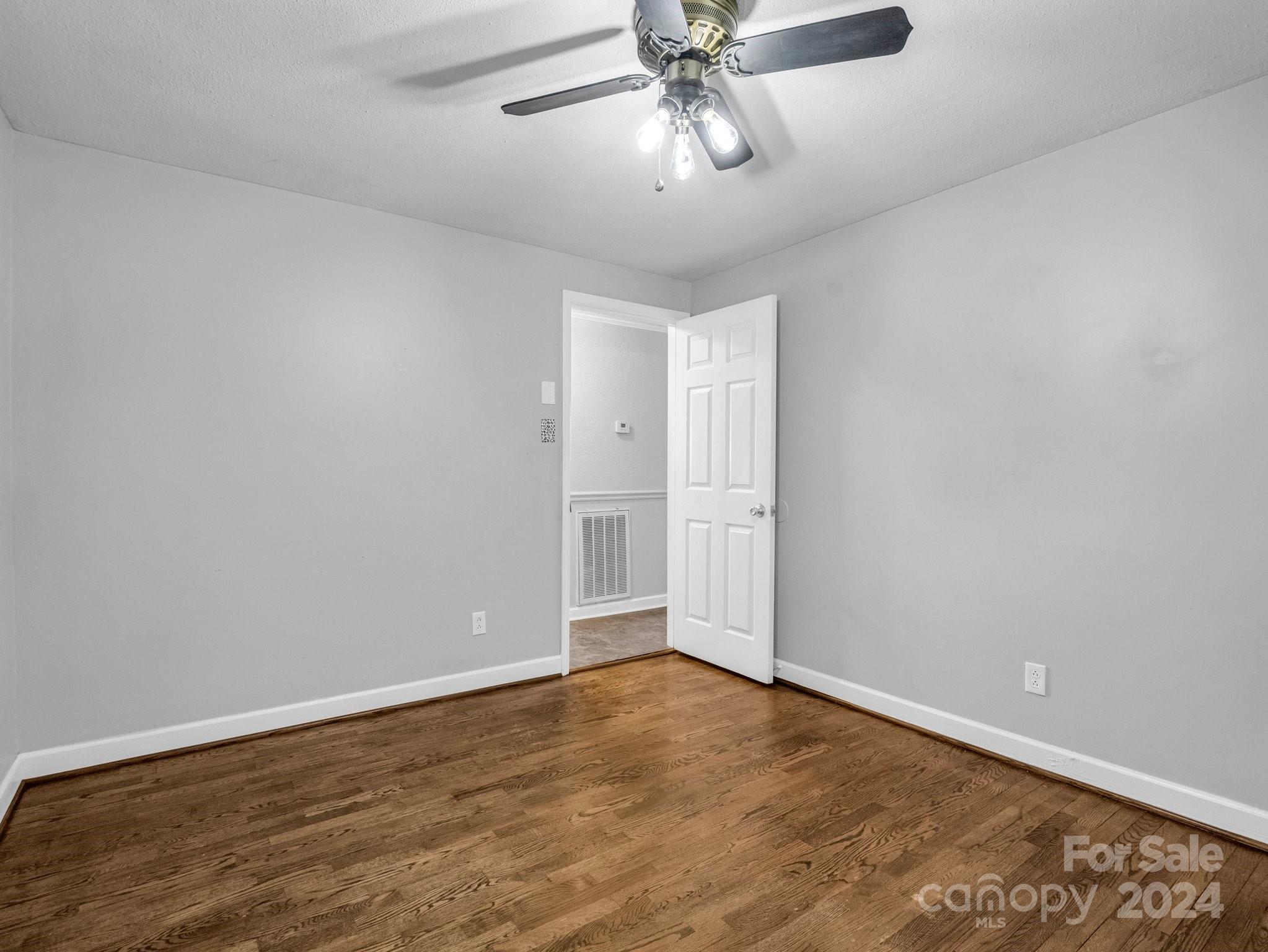 3401 Spencer Road Conover, NC 28613 - Photo 27 of 34 a view of an empty room and chandelier fan
