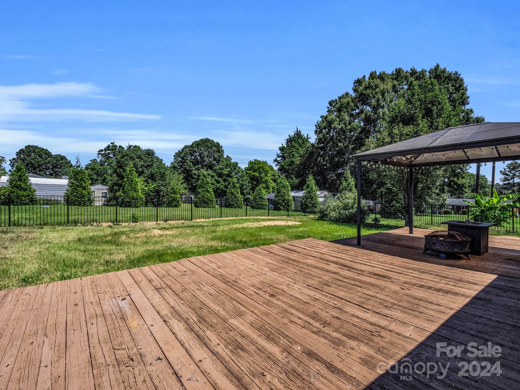3401 Spencer Road Conover, NC 28613 - Photo 30 of 34 a view of a backyard with a garden