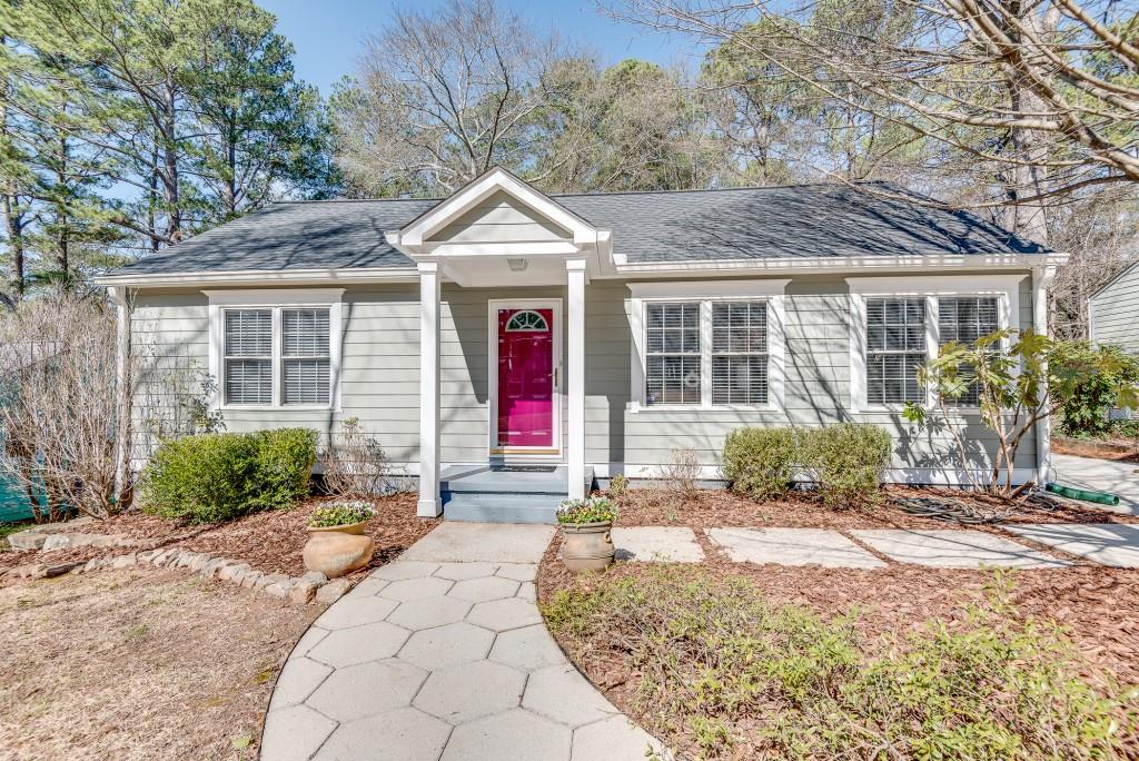 1391 Oldfield Road Decatur, GA 30030 - Photo 1 of 1 a front view of a house with garden