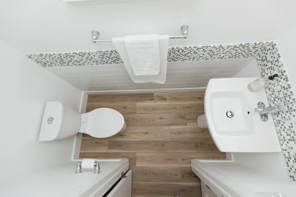 a bathroom with a sink and mirror