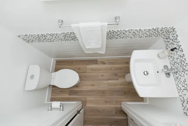 a bathroom with a sink and mirror