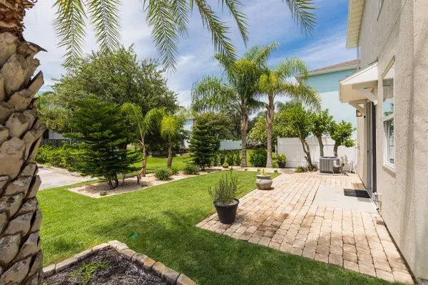 a view of a backyard of the house