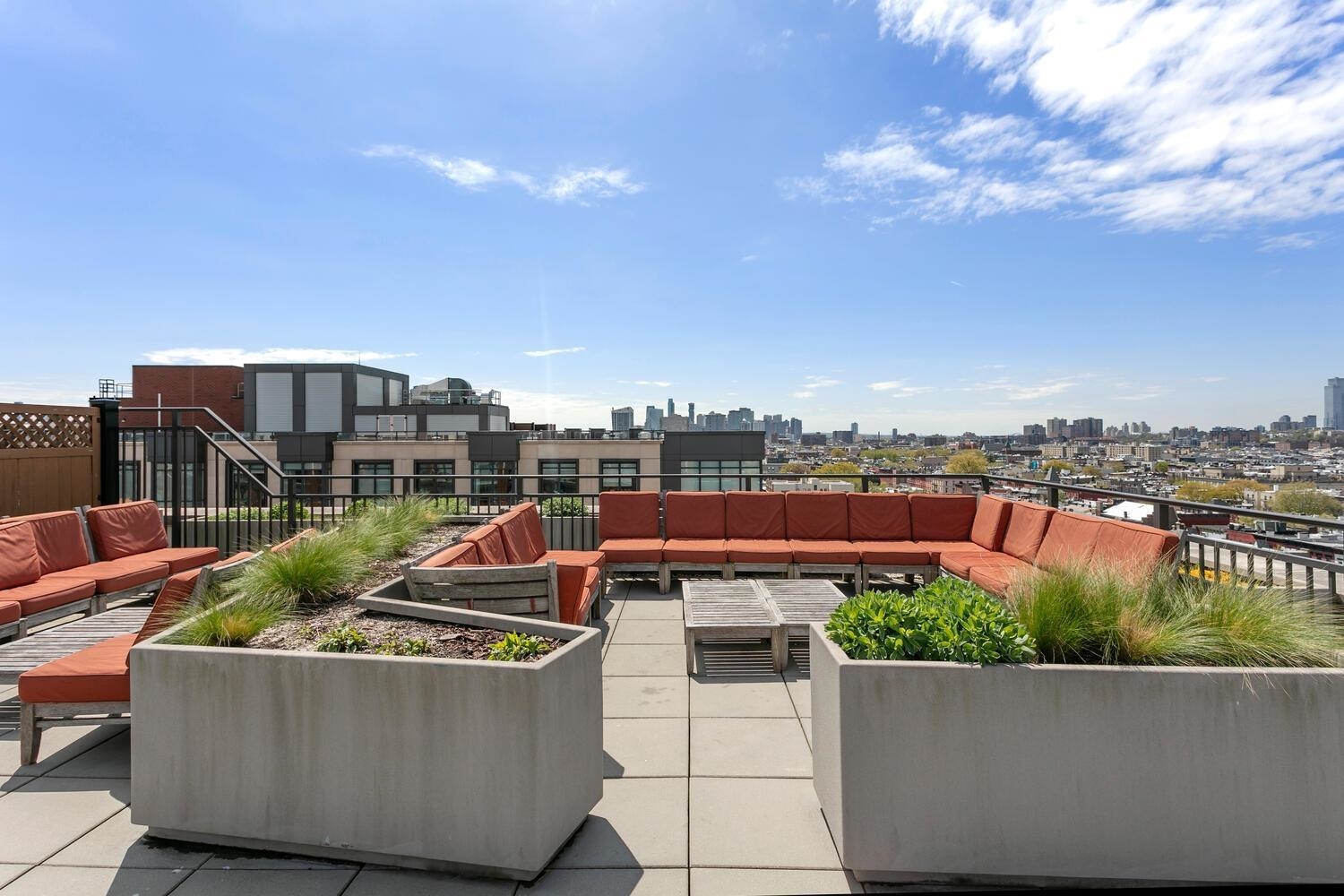 1100 Maxwell Lane, Unit 517 Hoboken, NJ 07030 - Photo 14 of 17 a view of a terrace with sitting area