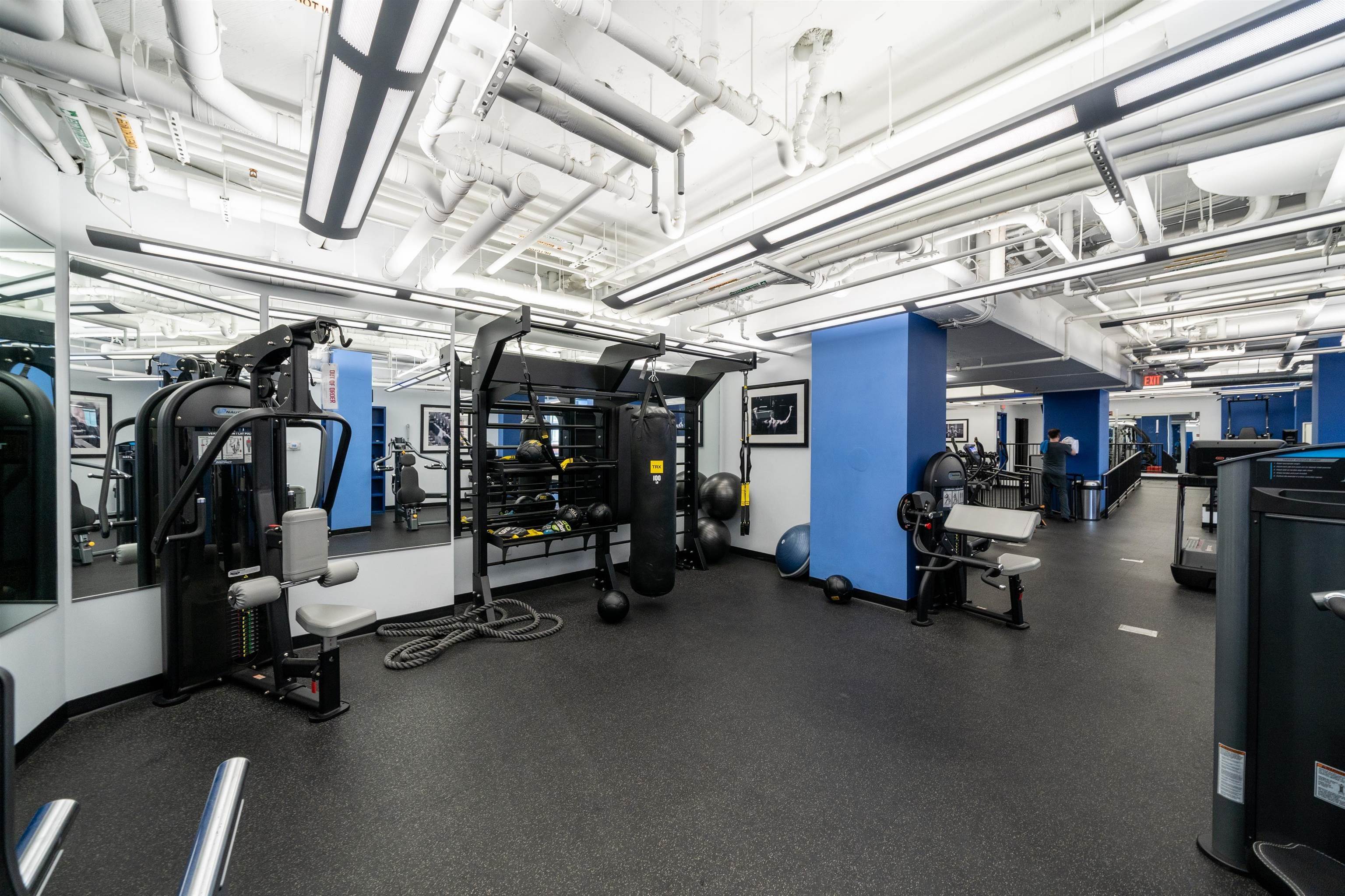 1100 Maxwell Lane, Unit 517 Hoboken, NJ 07030 - Photo 15 of 17 a view of a room with gym equipment